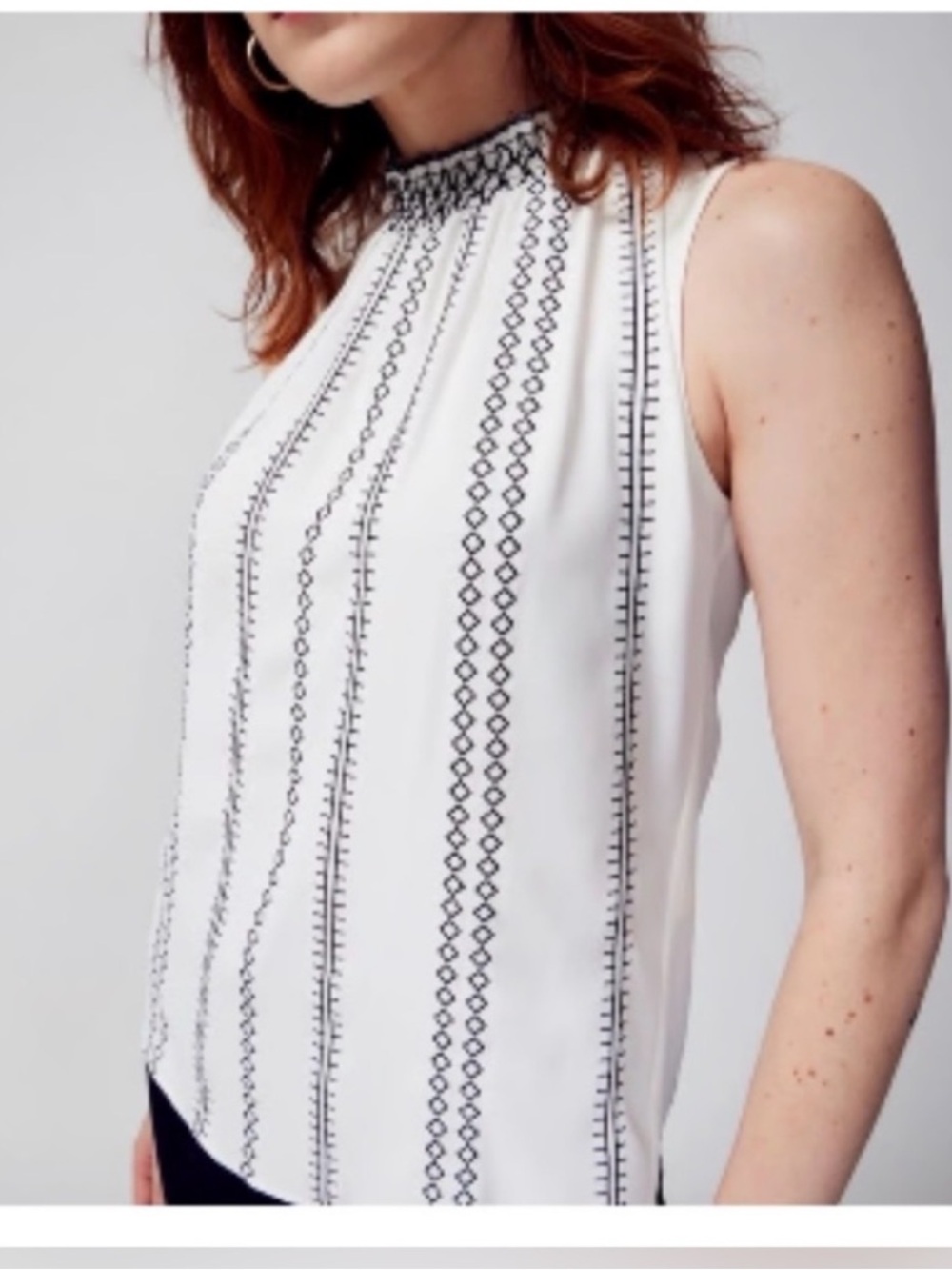 White House Black Market blouse, size 8, with zipper in back, mock neck, print